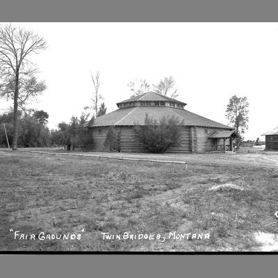 Black and white photo of the dance hall at the fairgrounds in Twin Bridges, Montana, 1950