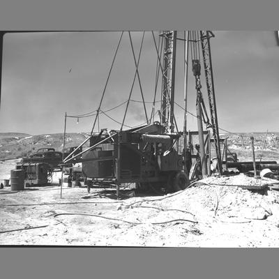 Men Working at the Base of an Oil Drilling Rig on Nyhart Ranch, Madison ...