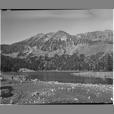 A Man and a Boy Walking Along the Shore of Branham Lake, Mill Creek 1954