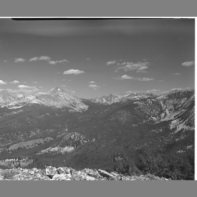 View of A snowy forested mountain range, Beaverhead County, Montana, 1956.