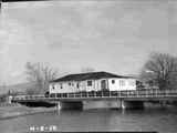 Dr. Seidenstickers House Crossing a Bridge On Its Way to Dillon, MT 1958