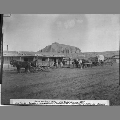 Wagons lead by horses outside of Point of Rock Hotel and Stage Station, Beaverhead County, 1895