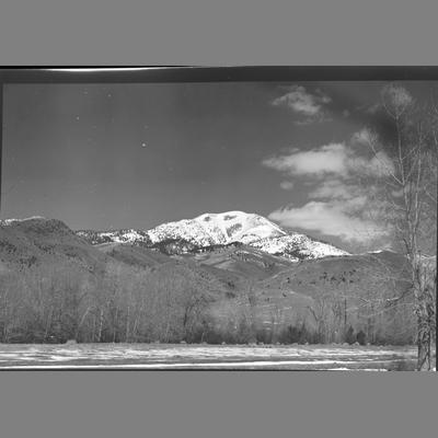 View of a Snow Covered Mountain from the Mouth of the Wisconsin Creek Placer Mine, 1955