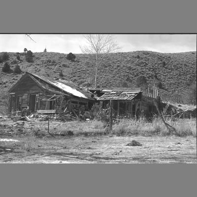 An abandoned house at the Mouth of the Wisconsin Creek Placer Mine, 1955
