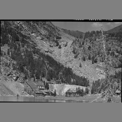Abandoned Buildings Along the Shore of a Tailing Pond 1956