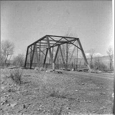 Metal Truss of Glen Bridge Over a River with a Dirt Roadway, April 12, 1959