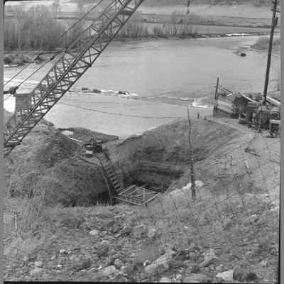 Crane Arm Visible Above Excavation Site to Help with the Construction of Waterloo Bridge, February 1961