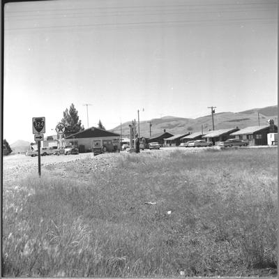 Armstead houses near Highway 324 by a Texaco gas station in Montana, July 1962.