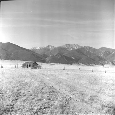 Photo of the Tobacco Root Range with a Cabin in the Distance, November 4, 1962