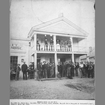 Group of Men on Front Porch of the Bannack Hotel, 1890
