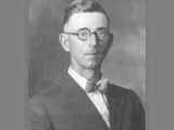 Formal Portrait of Thomas B. Brook Wearing a Suit and Bow Tie 1920