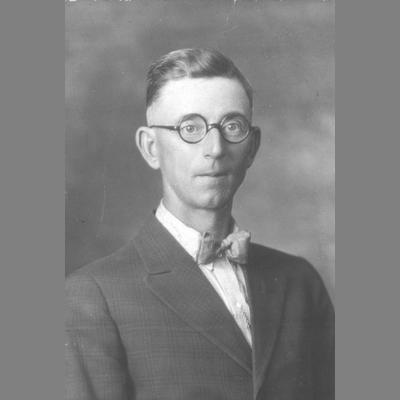 Formal Portrait of Thomas B. Brook Wearing a Suit and Bow Tie 1920