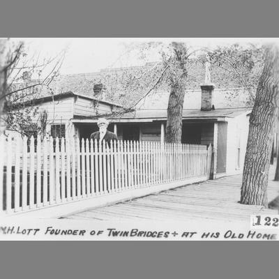 M. H. Lott the Founder of Twin Bridges Poses at His Old Home
