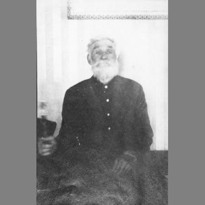 Elderly M. H. Lott Seated with a White Beard