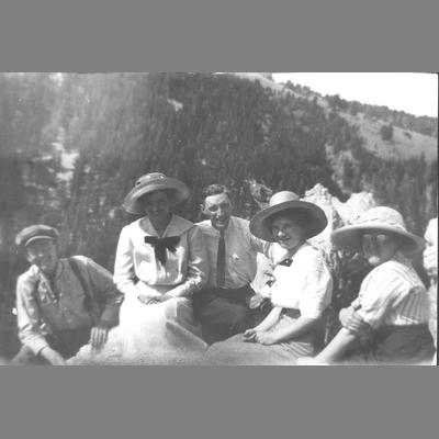 Two Men and Three Women Pose on a Rock During a Picnic Outing circa 1920