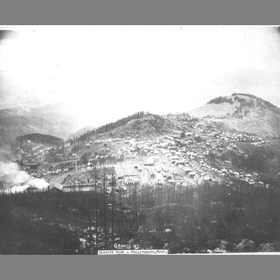 Long Distance View of Granite Mine with a Deforested Mountainside in the Background