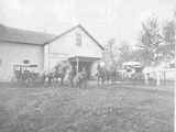 Two Light Buggies in Front of Wood Frame Livery Stable in Pony, Montana 1890