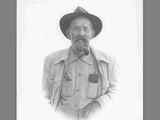 Vignette Portrait of Elderly Bearded Joe Redfern with Pipe Wearing a Hat