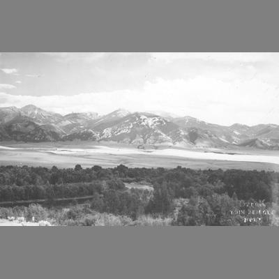 Panoramic View of Tree Lined River in Valley with Tobacco Root Mountains