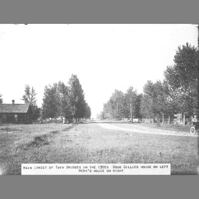 Head on View of Town's Main Street Flanked by Homes and Fences, Twin Bridges circa 1900