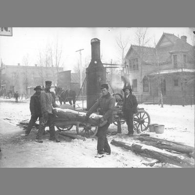 Four Men Working a Sawmill in Middle of Twin Bridge's Main Street circa 1890s