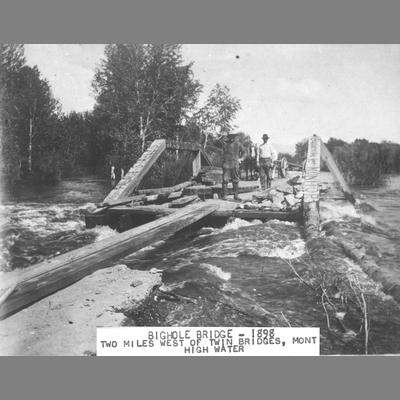 Twin Men Standing on the destroyed Big Hole Bridge due to flood waters 1898