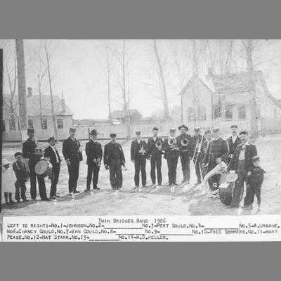 Twin Bridges Band Standing in Middle of Street With Their Instruments 1906