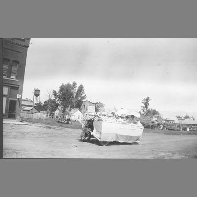 Automobile Covered With a Tarp and Displaying a Mounted Elk's Head in Twin Bridges Parade circa 1910