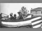 Six Men Ride in Decorated Automobile in Twin Bridges Parade circa 1920