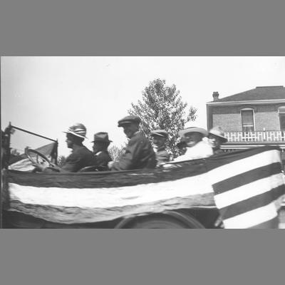 Six Men Ride in Decorated Automobile in Twin Bridges Parade circa 1920