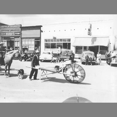 Man Pushing Oversized Decorated Wheelbarrow in Twin Bridges Parade circa 1950