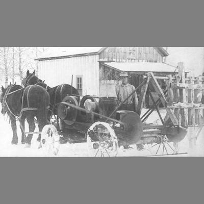 Early horse-drawn Farm Equipment in Snow