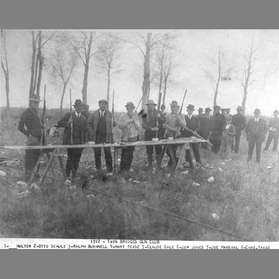 Men's Gun Club Posing with Shotguns 1912