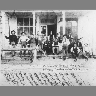 Group of Men Sitting and Standing Outside E.L. Smith General Store 1890