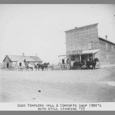 Two Stages Coaches in Front of the Templar Hall and Comforts Shop, circa 1900s
