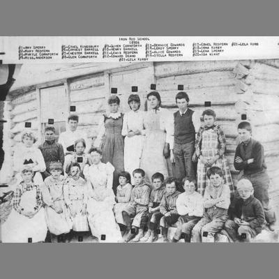 School Children Pose in Front of Iron Rod School, 1890