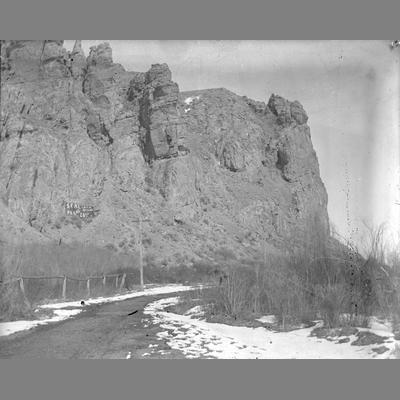 Snowy Road Running Underneath Cliff in Twin Bridges, 1896