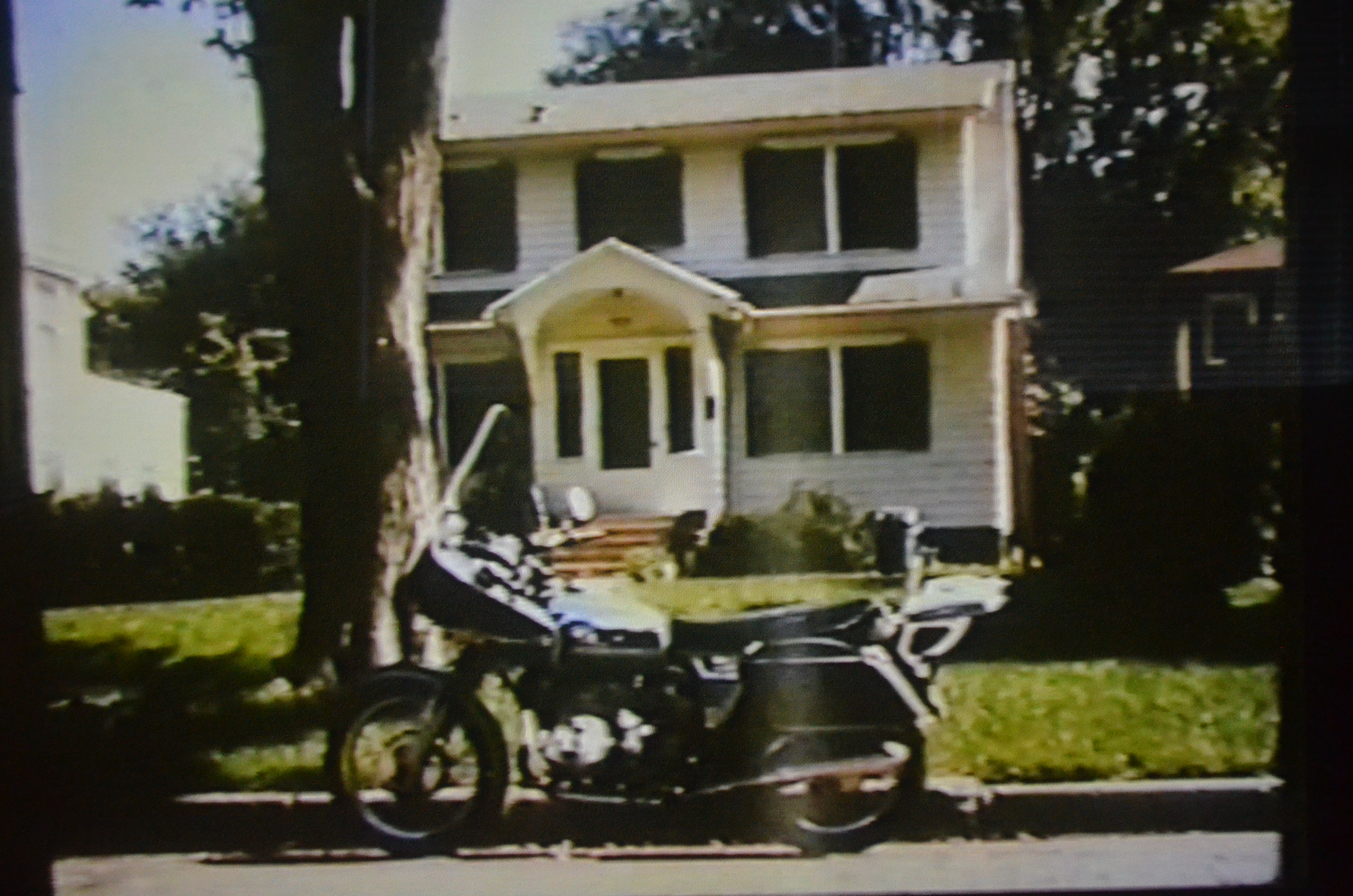 The DuPont/Vavrinchik motorcycle parked in front of the Pirsig residence