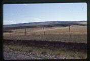 Wire fence with hills behind