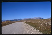 Gravel road leading to the Rocky Mountains