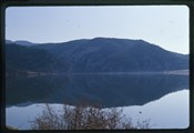 Gates of the Mountains - mountain reflection in water with bush