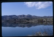 Gates of the Mountains - mountains and shoreline reflection in water