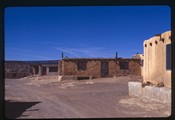 Acoma Pueblo, New Mexico - dirt road along adobe buildings