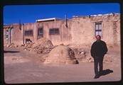 Acoma Pueblo, New Mexico - Frank Zoretich standing in front of adobe houses