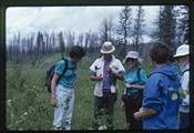 Linda Bierds, Jerry DeSanto, and Sydney Kaplan stand next to two women and Ivan Doig