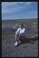 Carol Doig sitting on Egg Mountain in Montana