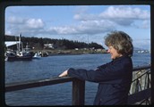 La Conner, Washington - Jean Roden looking over Swinomish Channel
