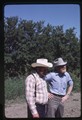 John Waldner and Ivan Doig standing on a dirt path