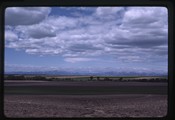 New Rockport, Montana - Teton Range and mountains beyond the farmland