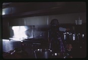 New Rockport Hutterite Colony - woman and child in colony kitchen